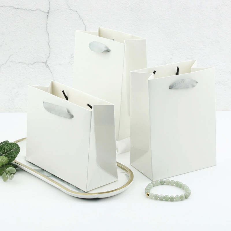 उच्च गुणवत्ता वाले बनावट वाले कागज उपहार बैग